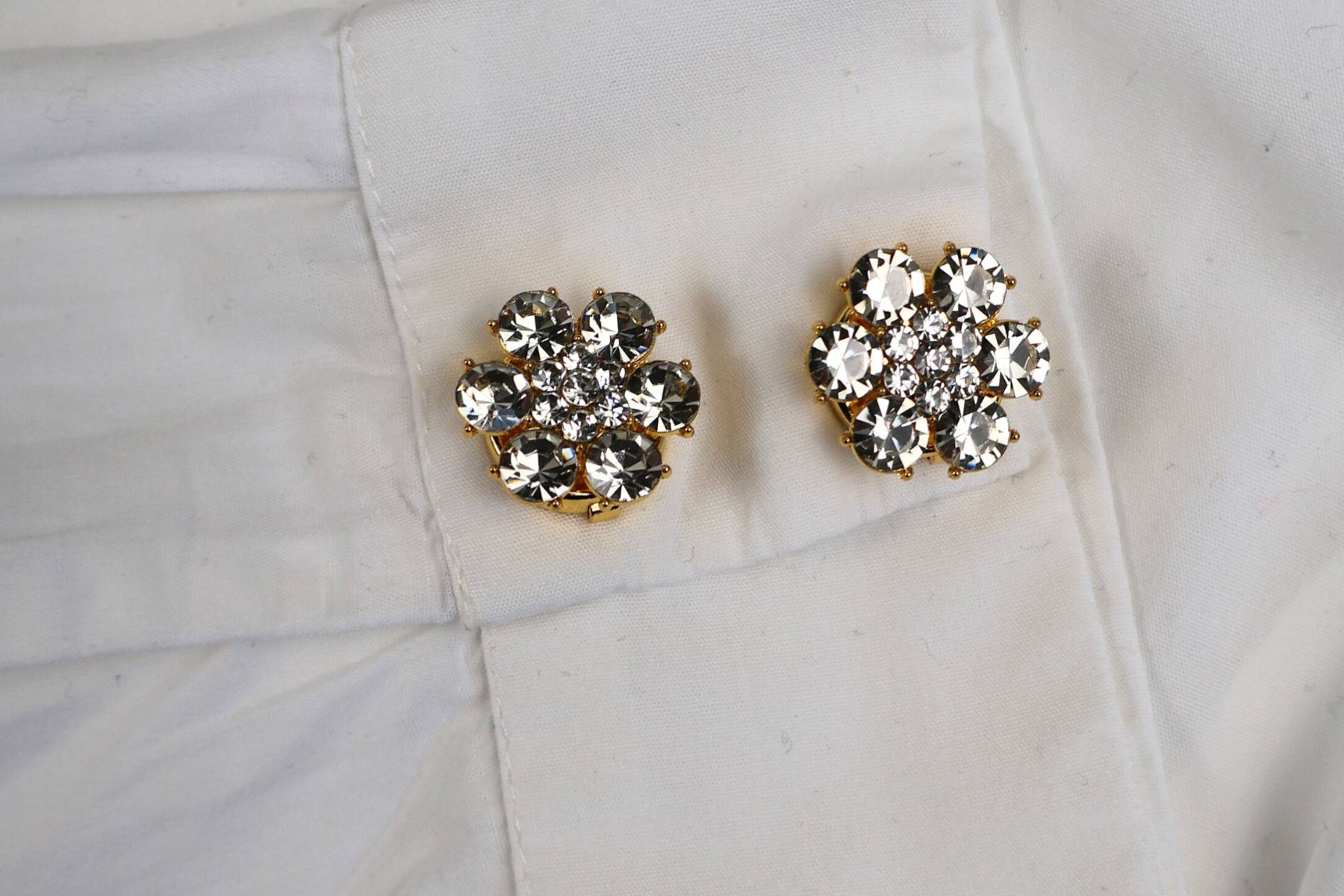 Wat zijn button covers? De ultieme styling-hack voor je garderobe