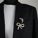 10025 and 10024 brooch pin silver croissant and gold silver bow