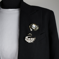 10033 and 10030 brooch pin eye with tear and swan gold silver stones