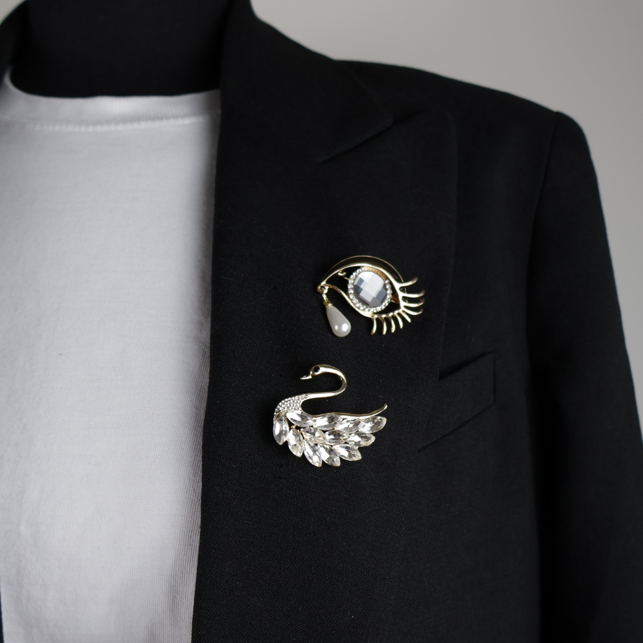 10033 and 10030 brooch pin eye with tear and swan gold silver stones