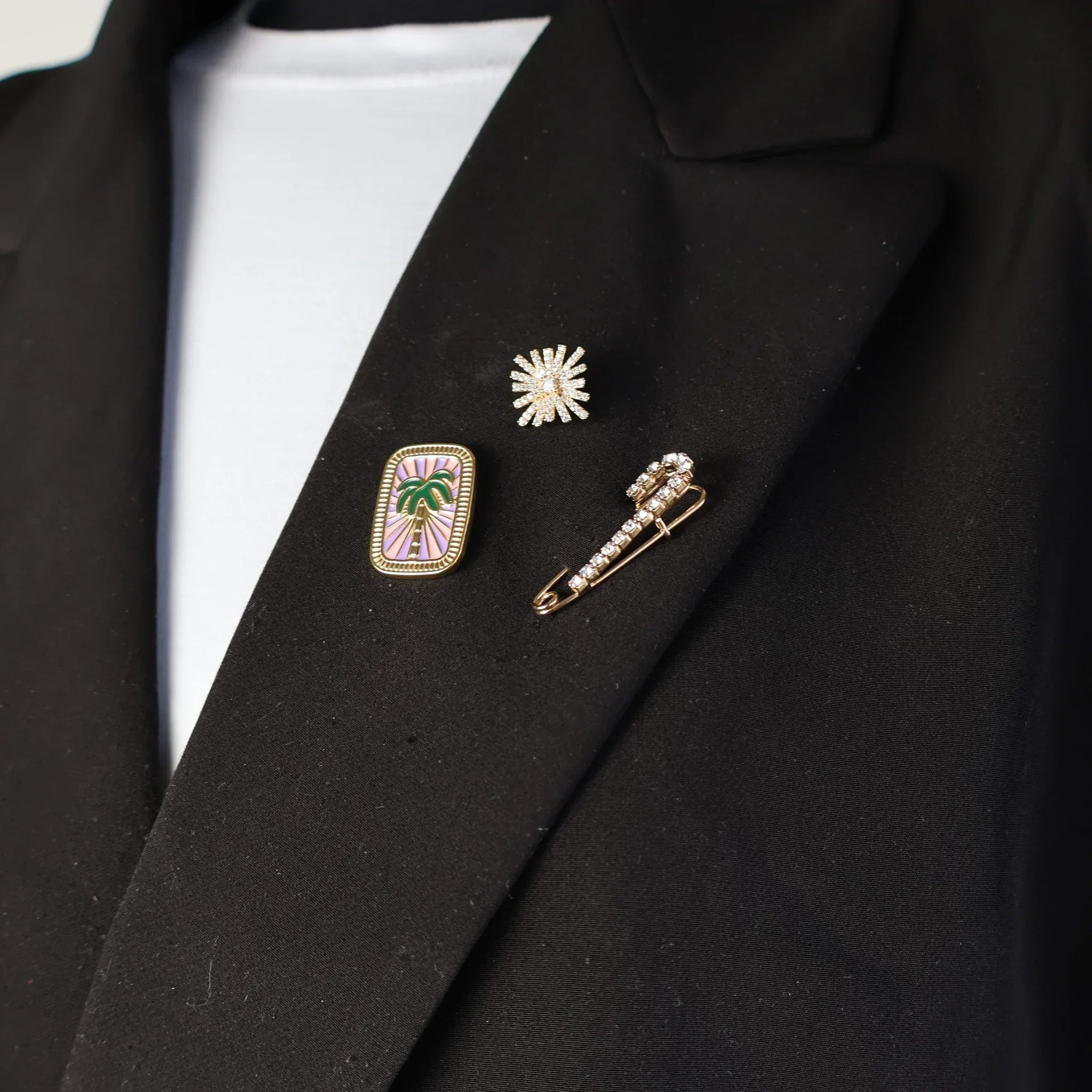 Broche or violet rose vert avec palmier