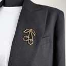 20033 pin gold cherries on blazer
