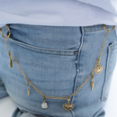 trouser chain gold with gold and white perndants summer vibes on jeans 