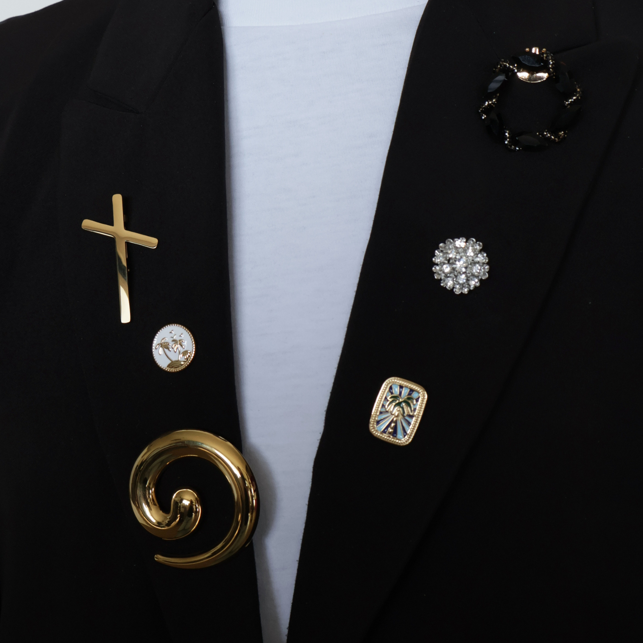 Broche met clipsluiting zwart en goud